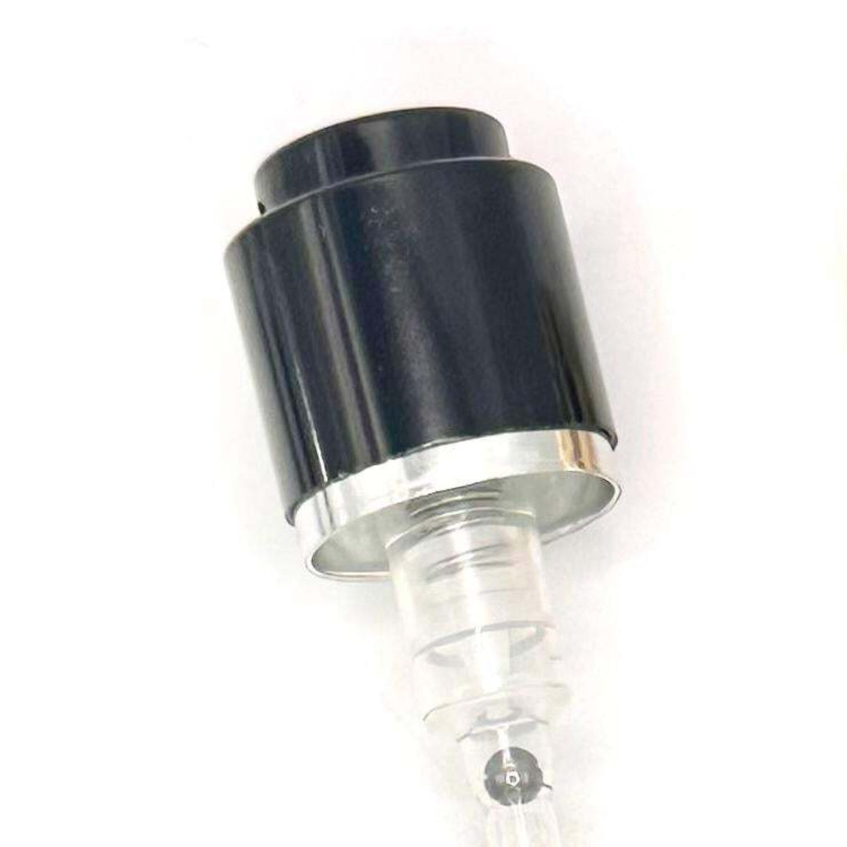 Close-up of the black collar and actuator of the 15mm Coster crimp-on perfume pump