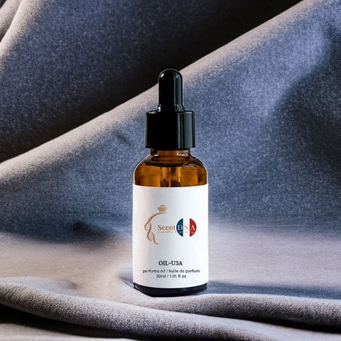 Scent DNA Inspired Perfume Oil in an amber dropper bottle on grey fabric, inspired by Black Saffron (Byredo)