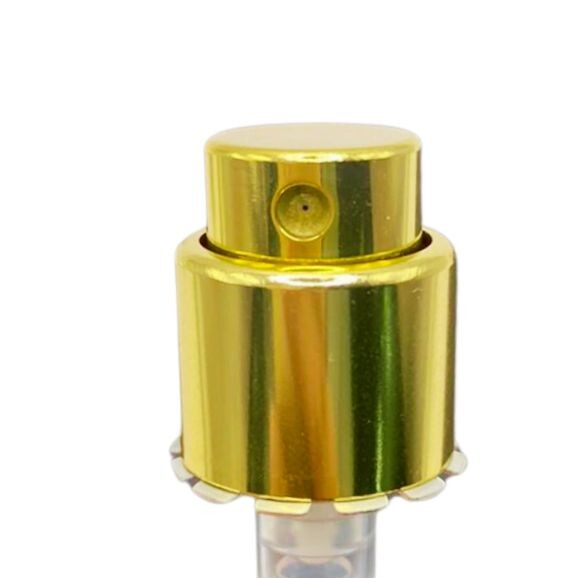 Close-up of the gold collar of the Crimp Less screw-on perfume pump